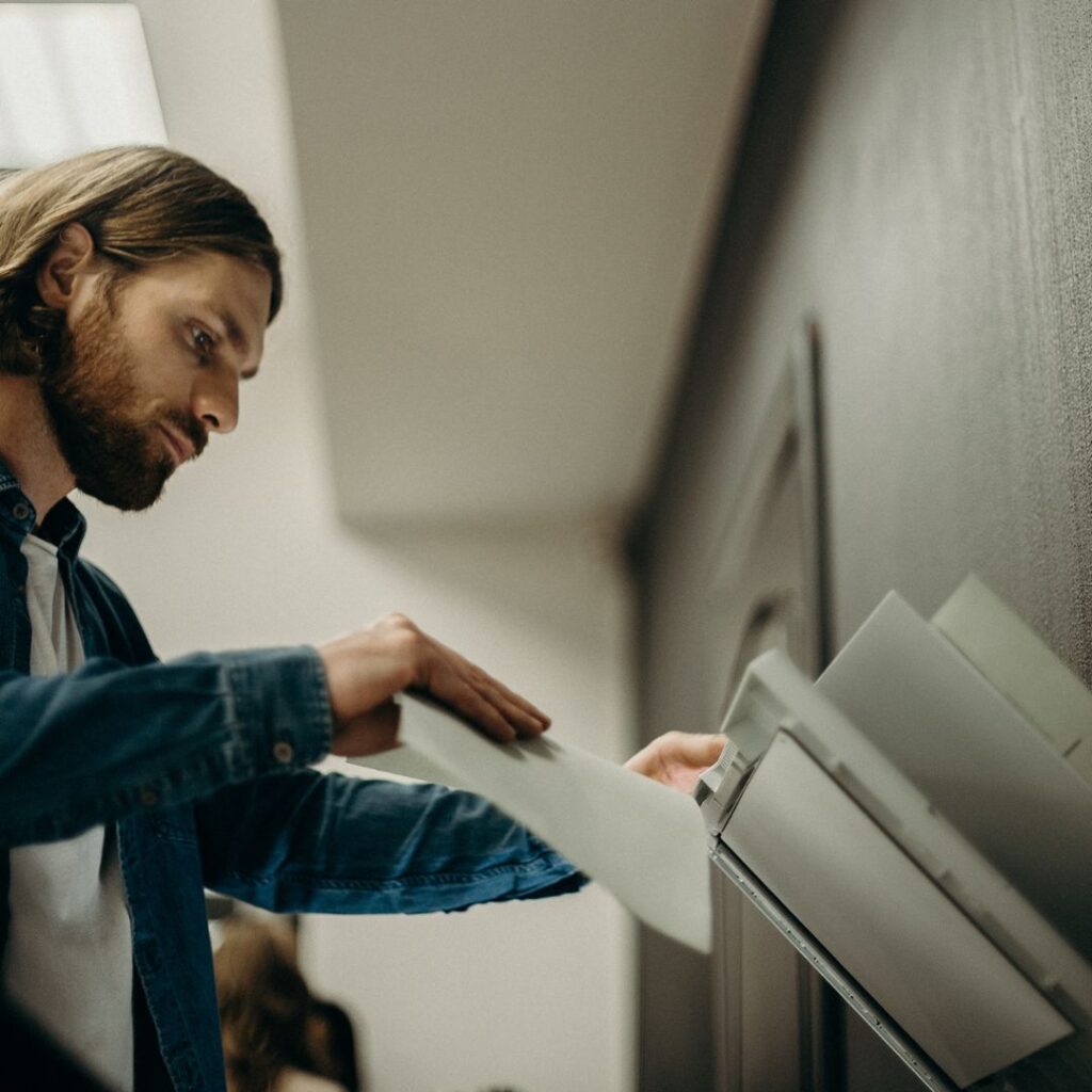 man using printer