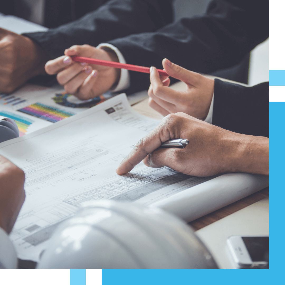 architects looking at blueprints